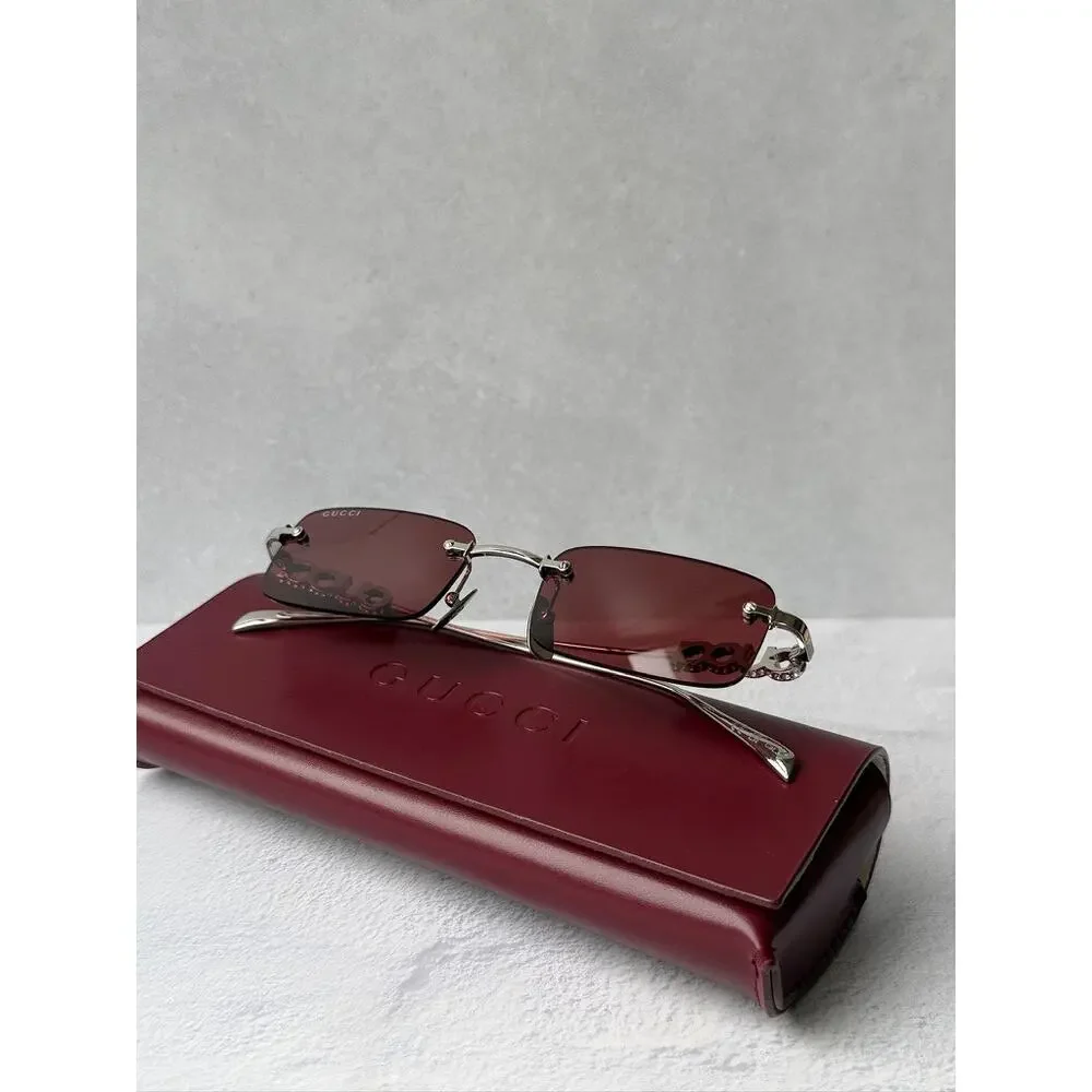 NEW Gucci GG1808S Silver Crystal Rimless Red Lens Sunglasses